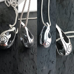 Different angles of Bealtaine flame pendant