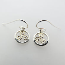 Load image into Gallery viewer, Spiral Triskelion Earrings, Sterling Silver Earrings with Brass Spiral Detail, Celtic Knotwork Earrings, Trinity Knot Jewellery, Irish Runestone Jewelry, Pagan Earrings