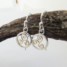 Load image into Gallery viewer, Spiral Triskelion Earrings, Sterling Silver Earrings with Brass Spiral Detail, Celtic Knotwork Earrings, Trinity Knot Jewellery, Irish Runestone Jewelry, Pagan Earrings