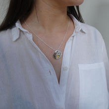 Load image into Gallery viewer, Lughnasa Round Pendant, Sterling Silver Pendant with Brass Detailing, Mixed Metal Necklace, Irish Deity Lugh Pendant, Pagan Light Festival Jewellery, Summer Equinox Jewelry