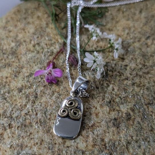 Dainty Standing Stone Brass Triskele Silver Pendant