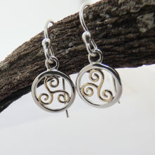 Load image into Gallery viewer, Spiral Triskelion Earrings, Sterling Silver Earrings with Brass Spiral Detail, Celtic Knotwork Earrings, Trinity Knot Jewellery, Irish Runestone Jewelry, Pagan Earrings